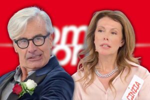 logo ued sullo sfondo ed arcangelo e cinzia in primo piano