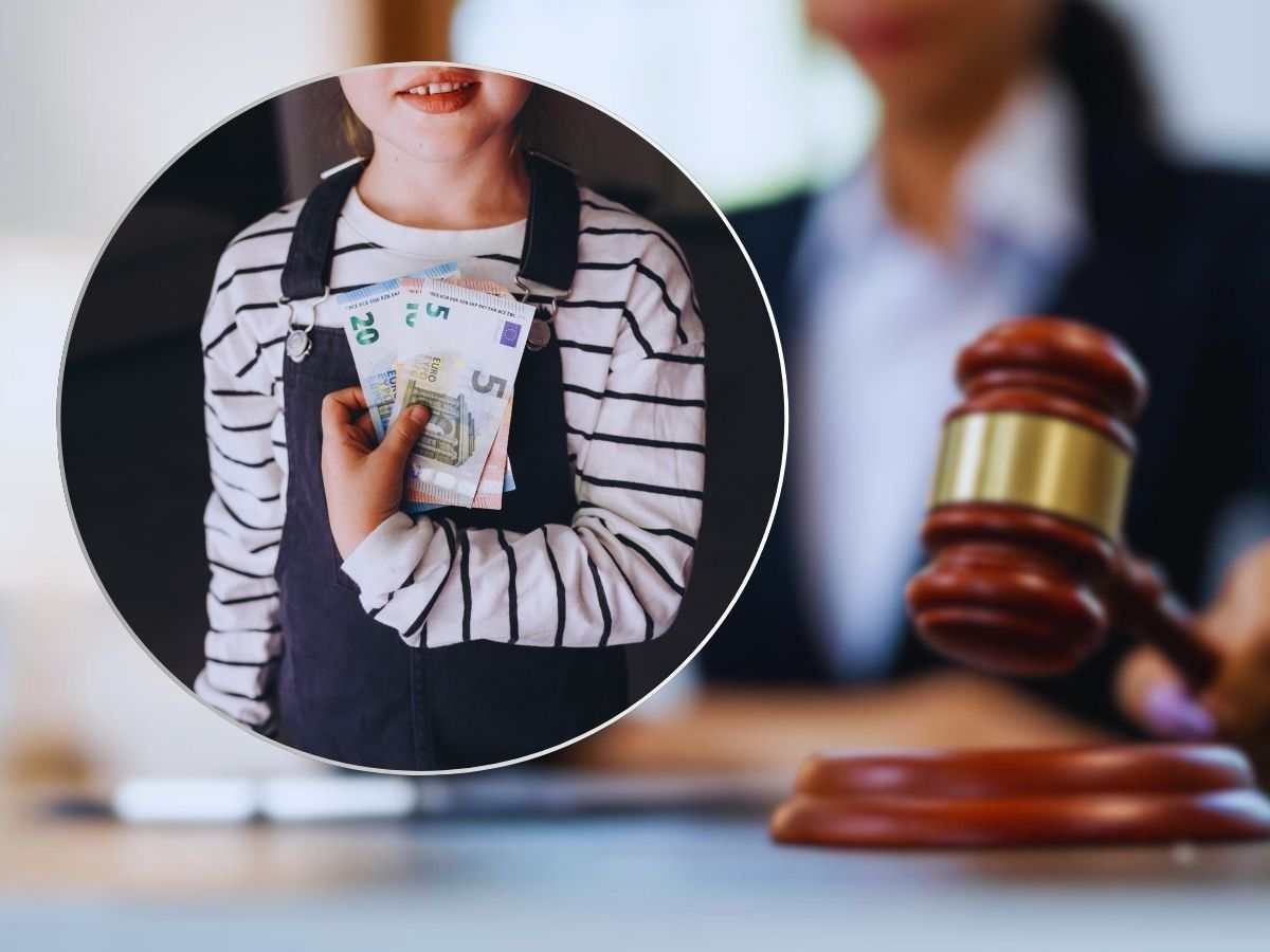 Giudice martelletto e bambina con soldi in mano