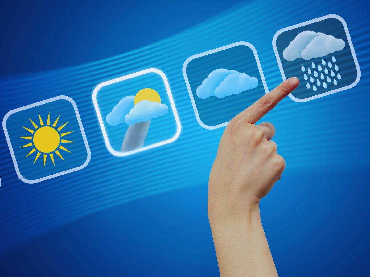 disegni meteo e mano che indica